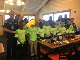 Hugh Bish students use reading skills, eat lunch with officers