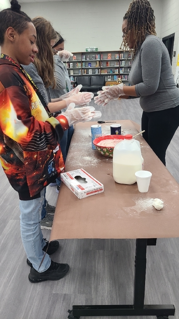 pictures of students making Indian tacos